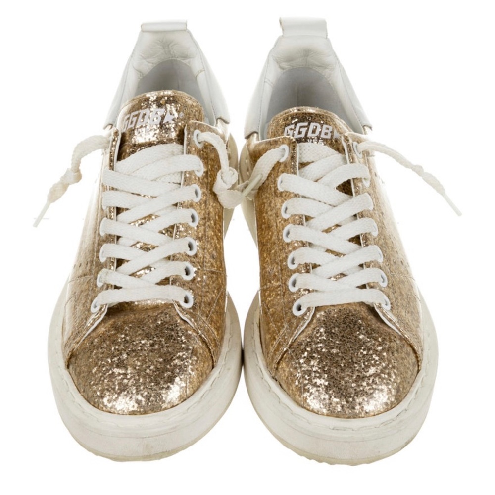 Gold tone Golden Goose.